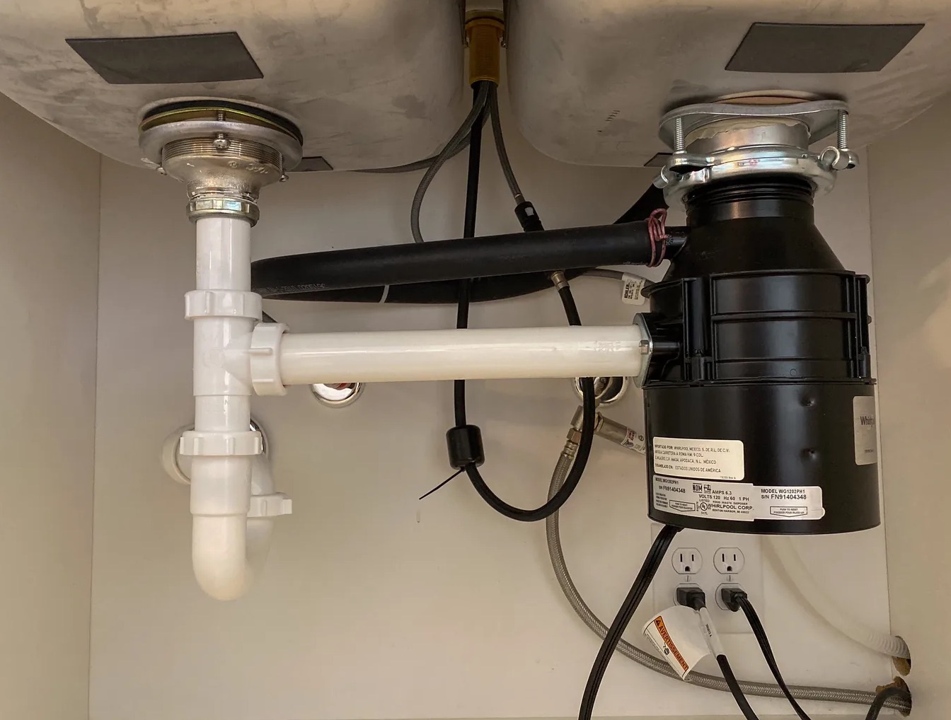 Leaky Garbage Disposal Cleanup in Kirkland, WA